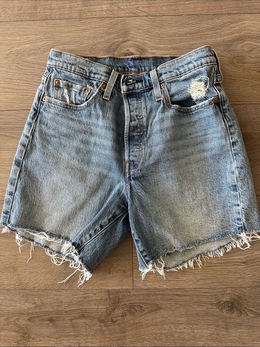 Levi's Light Wash Frayed Hem Denim Cutoff Shorts